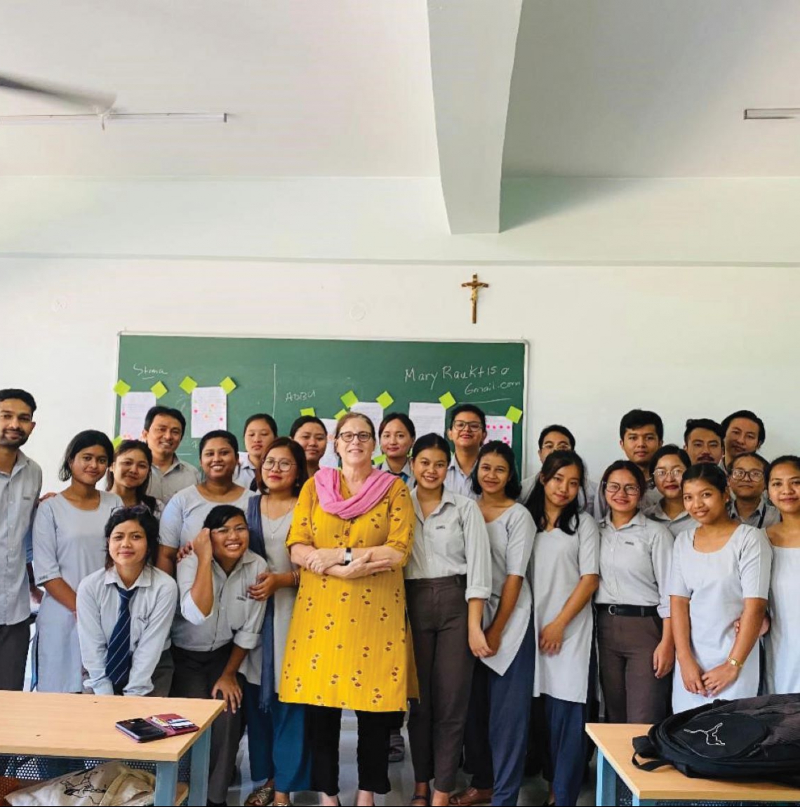 Dr. Rauktis with students in India